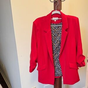 Skies are blue, red blazer size large